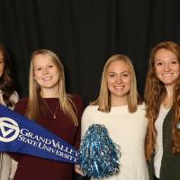 four students with props